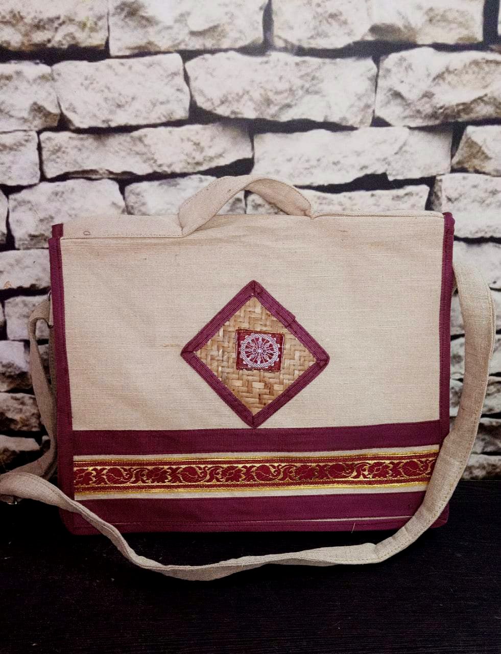 Satchel with maroon trim and Konark chakra motif